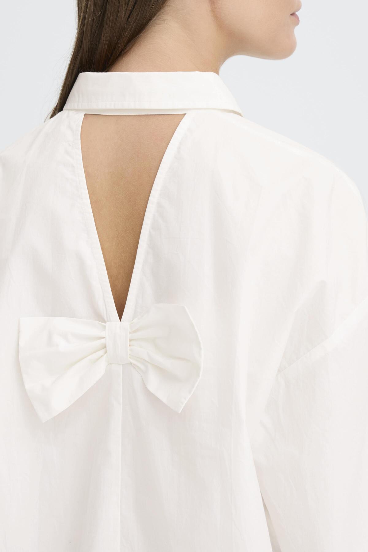 Bluse mit Schleifen Rückendetail