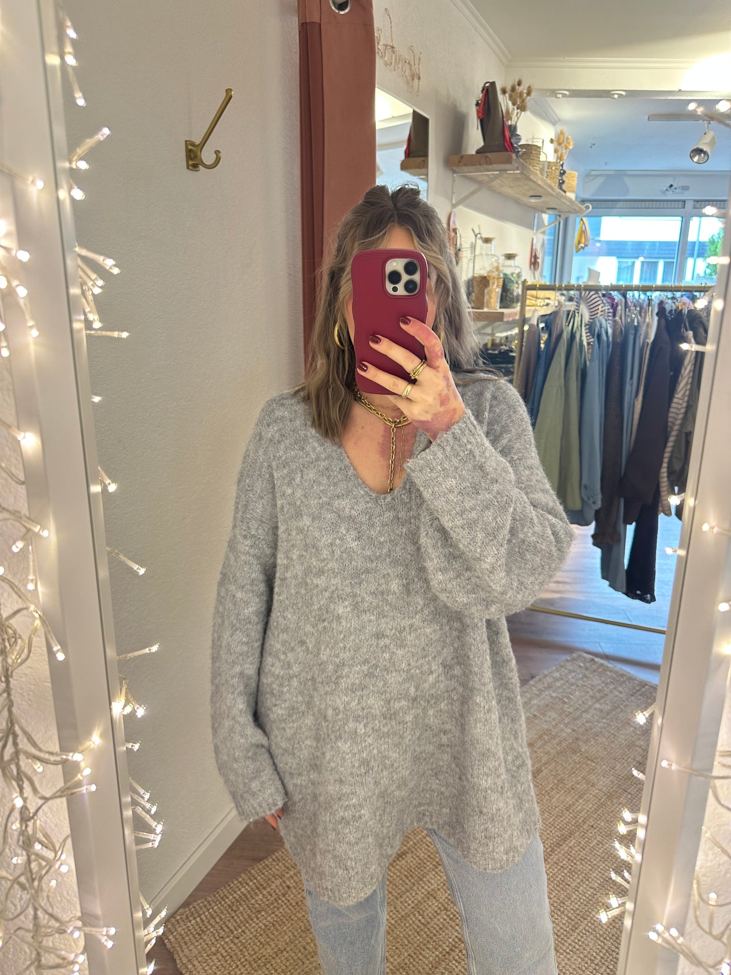 Langer Strickpulli mit V-Ausschnitt versch. Farben