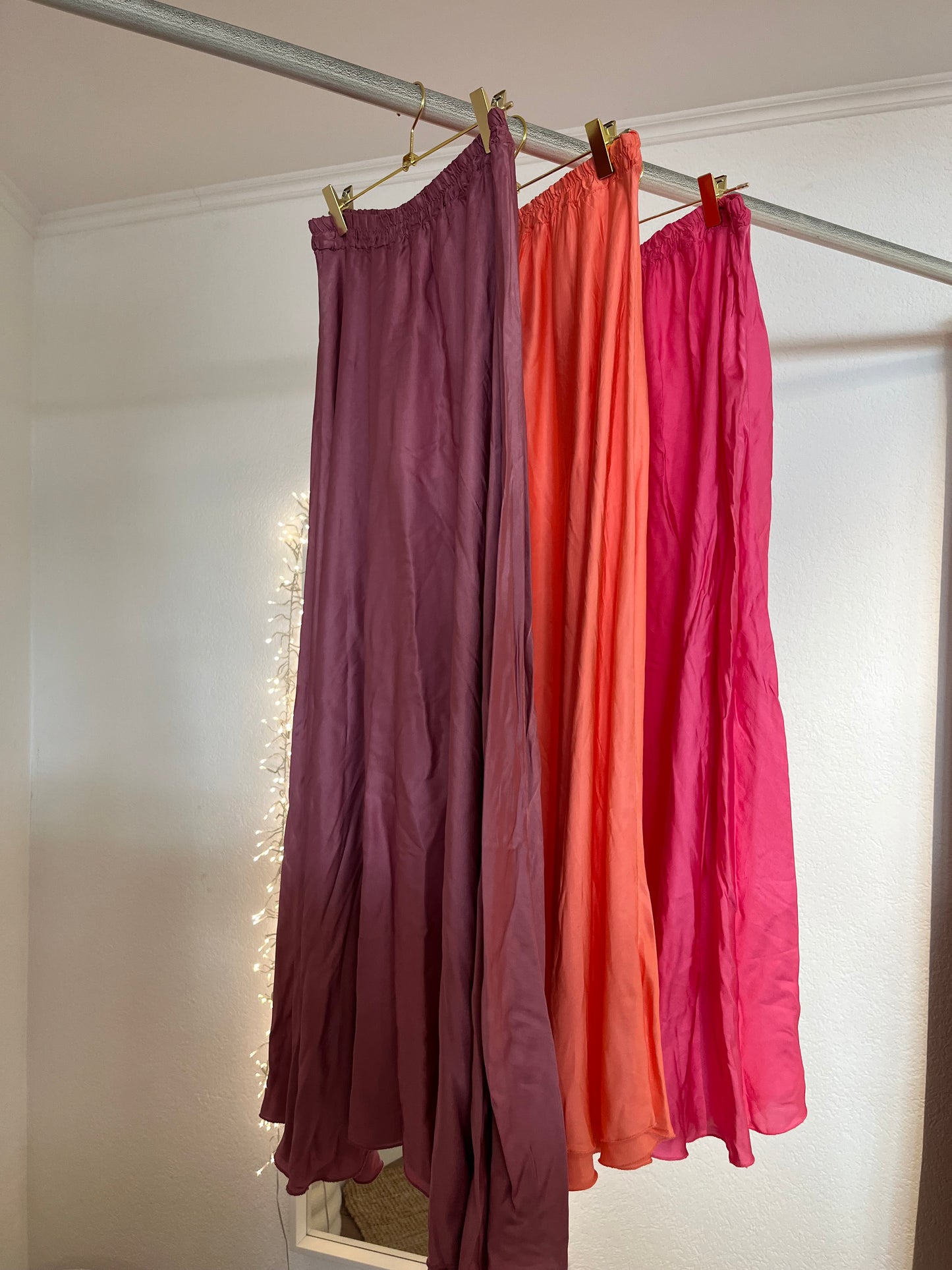 Rock in Seidenoptik versch. Farben